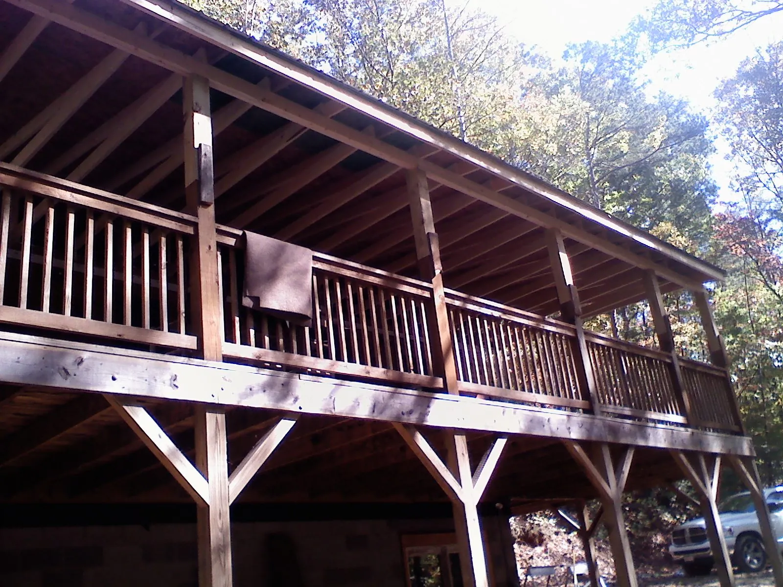 Timber framing under a new elevated porch and deck — Roof Leak Repair in Swink by Roofing Brothers